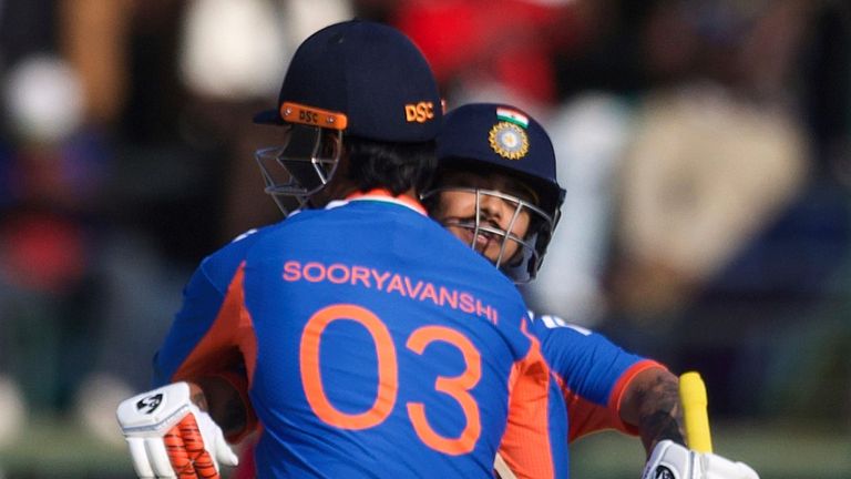 India's Vaibhav Sooryavanshi (left) and Ishan Kishan (right) embrace during a T20 cricket international (Associated Press)