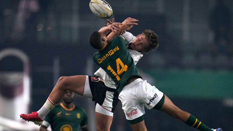 Wales' Ellis Mee, rear, jumps for the ball with South Africa's Jaco Williams during the Nations Championship Test rugby match between South Africa and Wales, in Durban, Saturday, July 18, 2026. (AP Photo/Themba Hadebe)