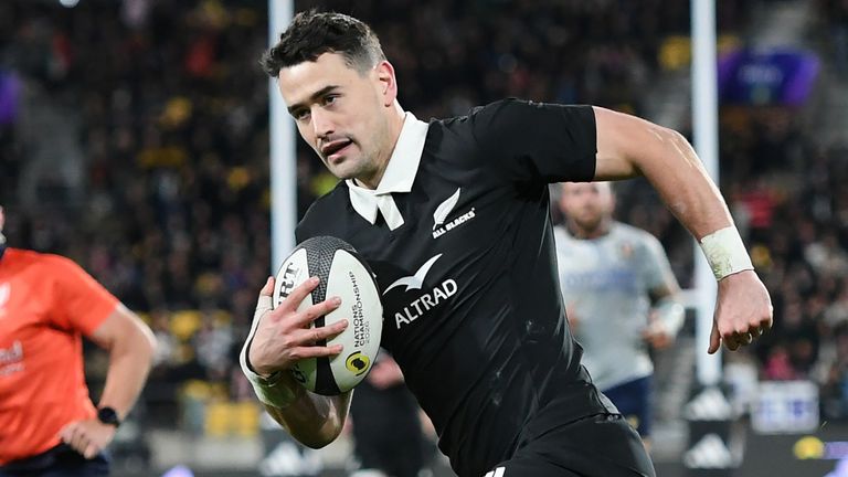 New Zealand's Will Jordan runs in to score against Italy (Kerry Marshall/Photosport via AP)