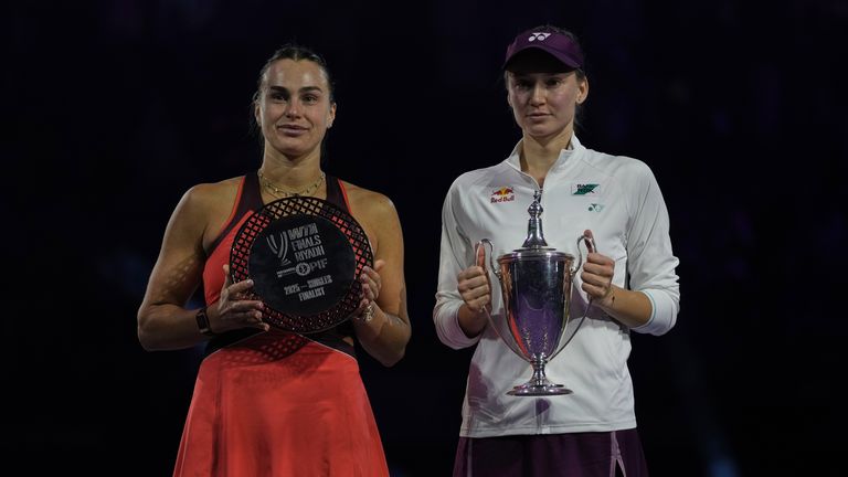 Elena Rybakina of Kazakhstan (right) holds her trophy poses with runner up Aryna Sabalenka (left)