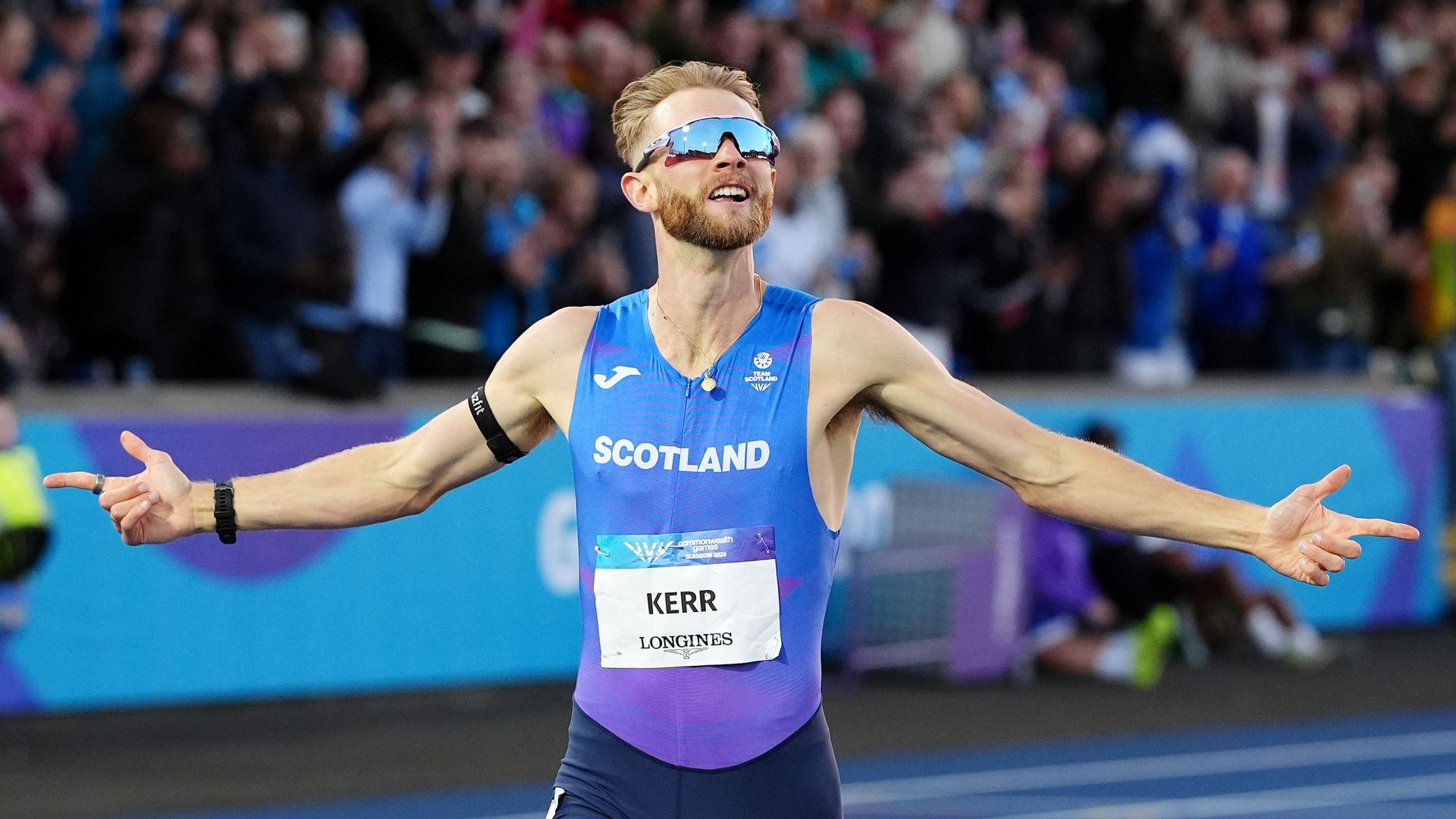 Kerr wins gold two weeks after setting mile record, Sawyers wins long jump gold
