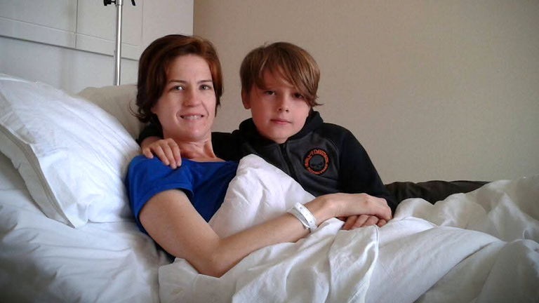 Joash McCullough (right) and his mother Jess. Pic: Sky News