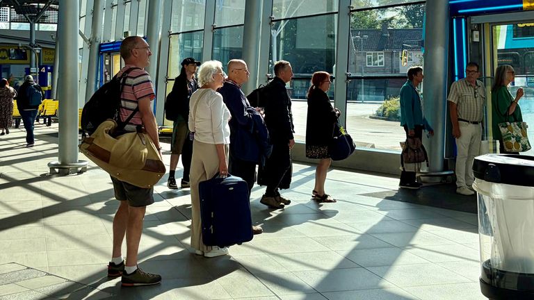 Passengers at Liverpool South Parkway station. Pic: PA