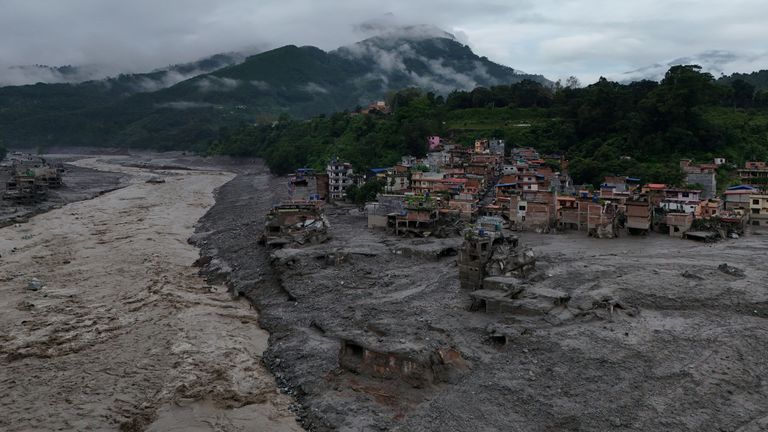 A drone view shows mud covering properties following a flash flood in Trishuli, Nuwakot district, Nepal, August 27, 2026. REUTERS/Navesh Chi