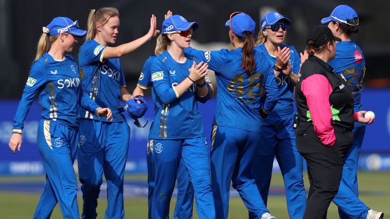 Alexa Stonehouse of MI London Women celebrates with teammates after taking the wicket of Amy Jones of London Spirit Women (not pictured) dur