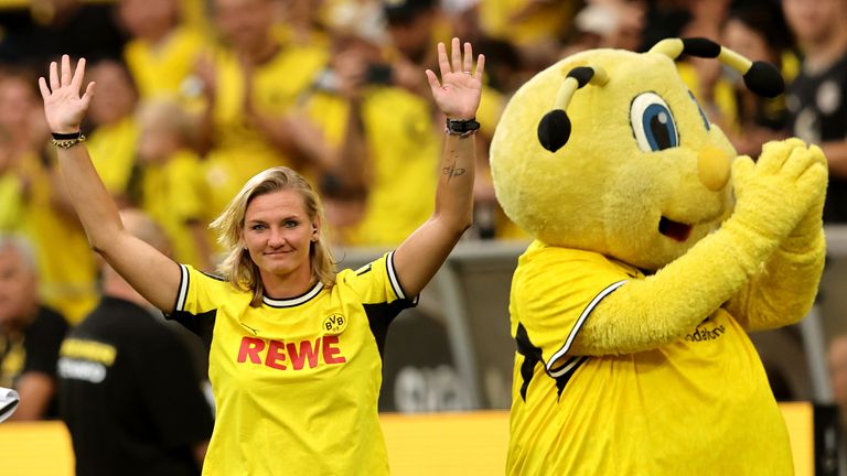 Germany legend Alexandra Popp is introduced to the Borussia Dortmund crowd