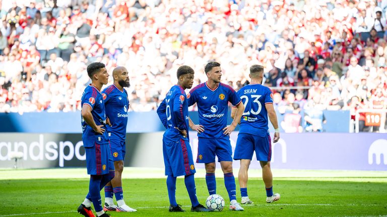 Amad Diallo and teammates of Manchester United look on during the pre-season friendly
