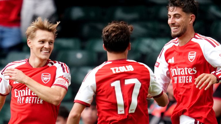 Martin Odegaard, Christos Tzolis and Kai Havertz celebrate Arsenal's third goal against Man City 