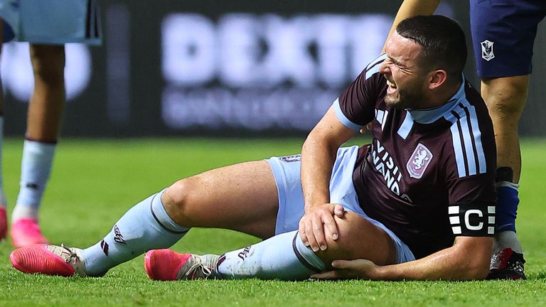 John McGinn of Aston Villa goes down with an injury during the pre-season friendly match between Aston Villa and Pathum United
