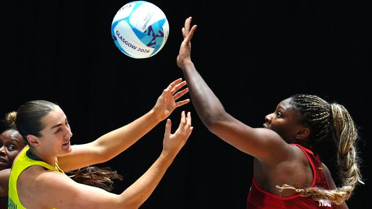 Sophie Garbin of Australia and Halimat Adio of England in action 