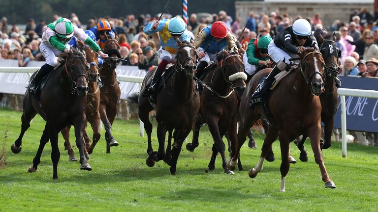 Bacio, ridden by Juan Hernandez (right), on the way to winning the Coolmore City Of Troy Nunthorpe Stakes at York