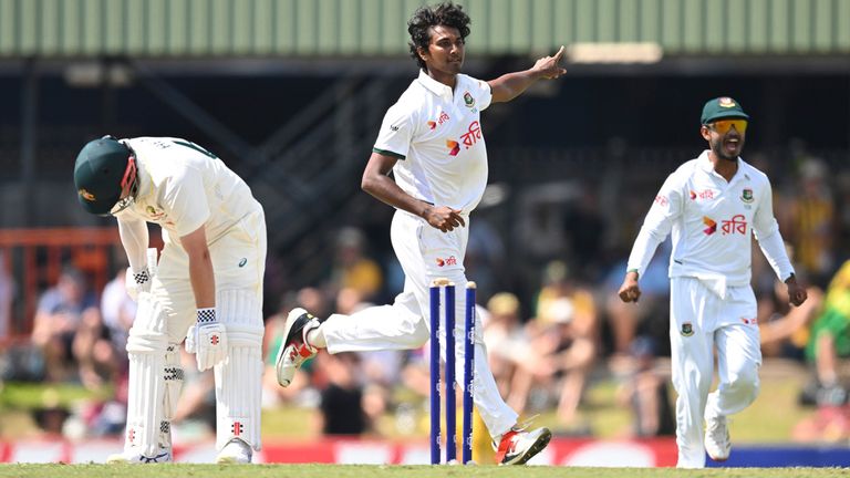 Hasan Mahmud celebrates taking Australia opener Travis Head's wicket
