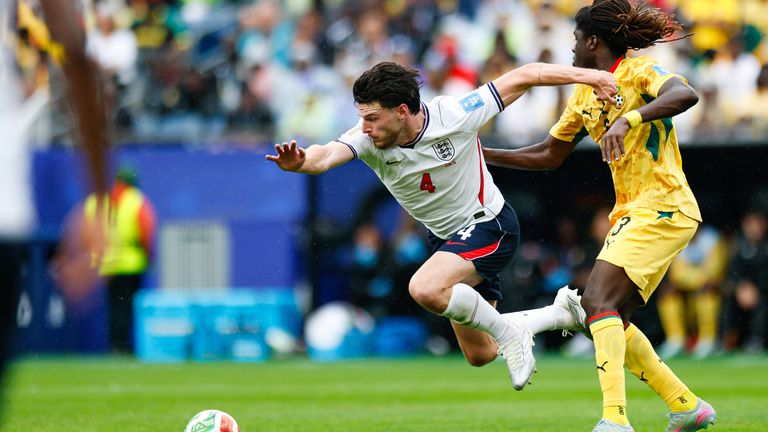 Ghana's Caleb Yirenkyi goes up against Declan Rice of England at the World Cup