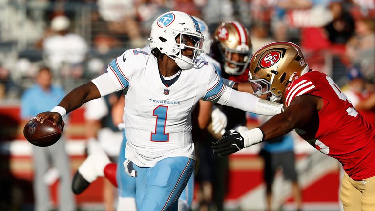 Tennessee Titans quarterback Cam Ward is pressured by San Francisco 49ers defensive lineman Titus Leo