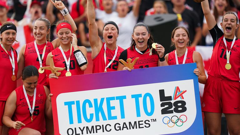 Canada's women's team celebrate their flag football world title that also clinched their spot at the Los Angeles Olympics in 2028