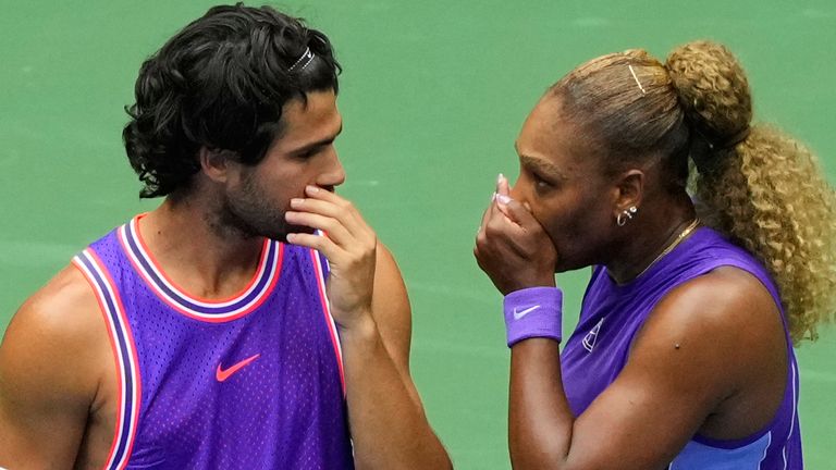 Carlos Alcaraz, of Spain, left, and Serena Williams, of the United States, talk on the court during a mixed doubles match at the U.S. Open tennis championships, Tuesday, Aug. 25, 2026, in New York. (AP Photo/Yuki Iwamura)