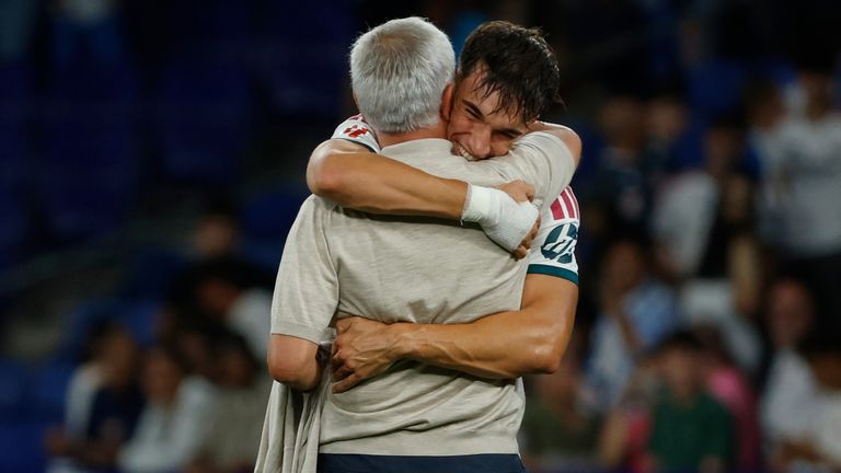 Real Madrid's Carlos Espi celebrates with his Real Madrid head coach Jose Mourinho