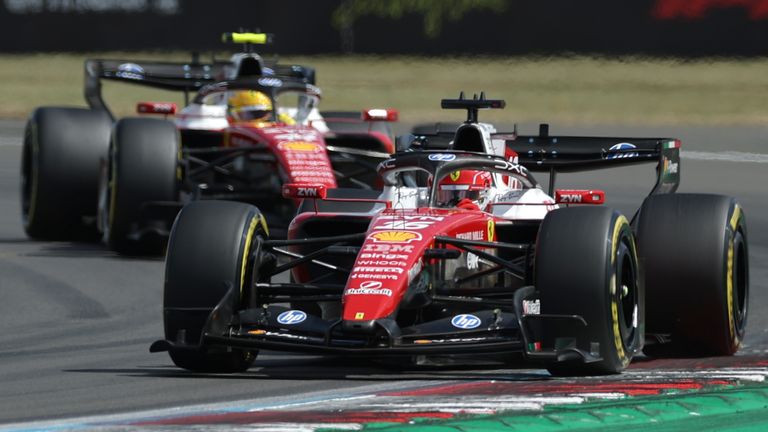 Ferrari driver Charles Leclerc of Monaco steers his car followed by Ferrari driver Lewis Hamilton of Britain during the British F1 Grand Prix, in Silverstone, England, Sunday, July 5, 2026. (AP Photo/Morgan Harlow)