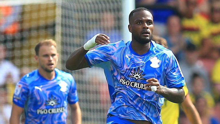 Cyle Larin celebrates after pulling a goal back for Southampton
