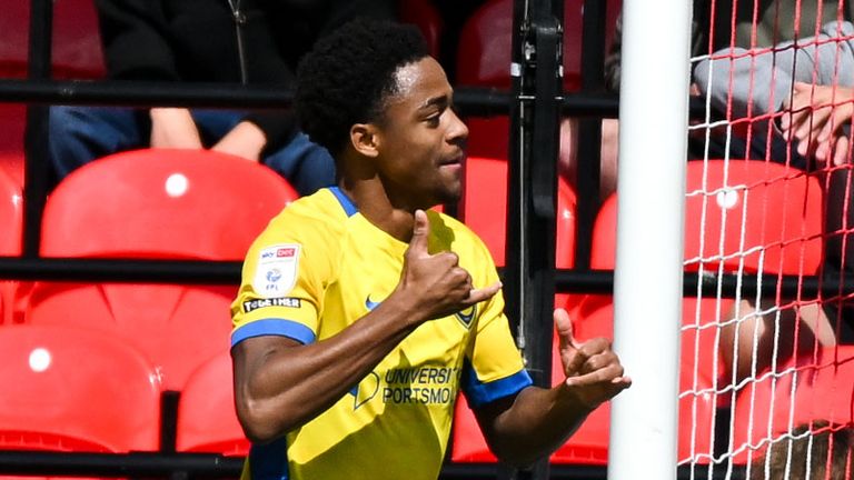 Ryan Kavuma-McQueen celebrates after opening the scoring for Portsmouth at Lincoln