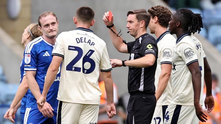 Oliver Skipp is sent off by referee Ben Toner during Leicester's 2-1 loss to Burton Albion