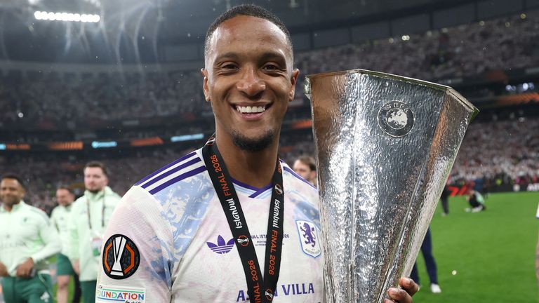 Ezri Konsa poses with the Europa League trophy following Aston Villa's 3-0 win over Freiburg