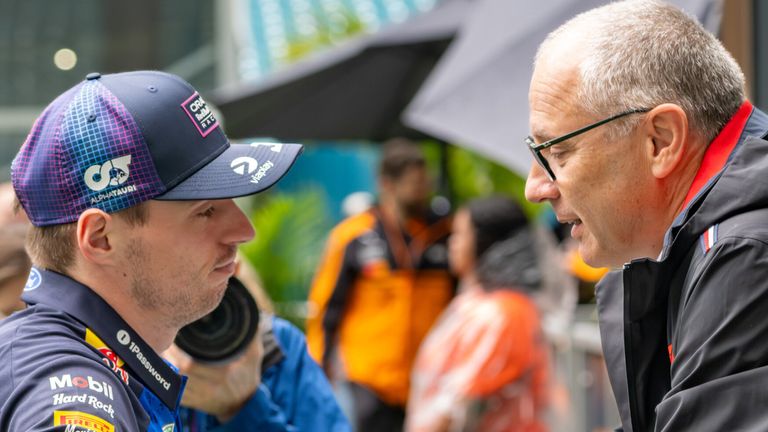 Max Verstappen and Stefano Domenicali (Erlhof/picture-alliance/dpa/AP Images)
