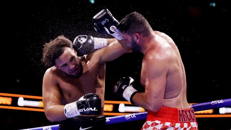 Filip Hrgovic lands a punch on Moses Itauma (left) during his win