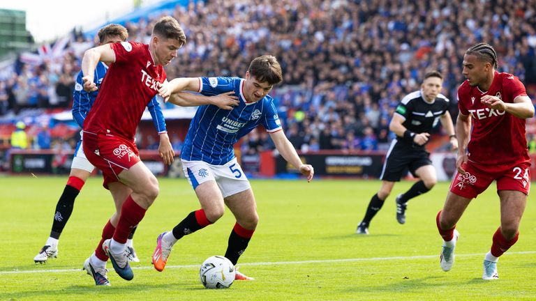 Rangers' Findlay Curtis and Aberdeen's Kevin Nisbet collide in the box