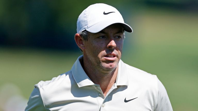 Rory McIlroy walks to the tee at the 12th hole during the first round of the BMW Championship