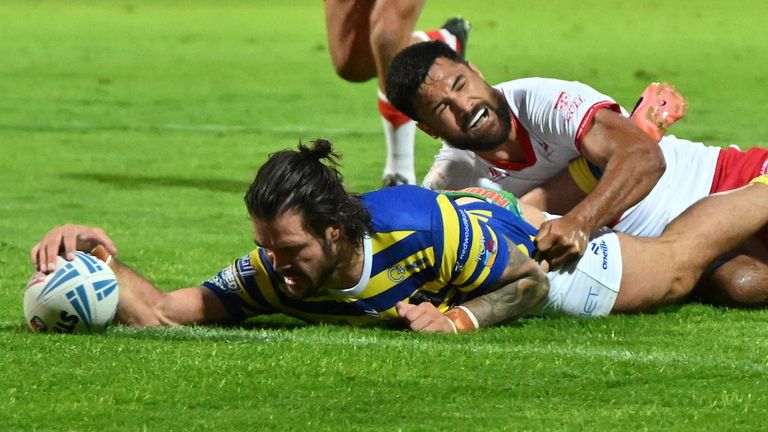 Warrington's James Bentley scores a try against Hull KR.