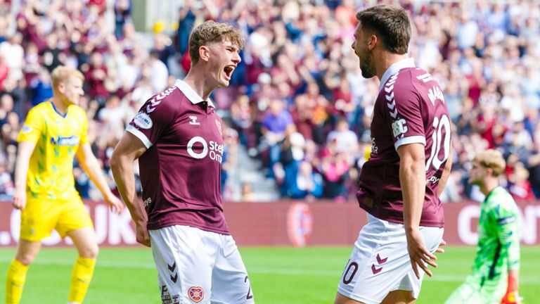 James Wilson (left) opened the scoring for Hearts