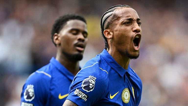 Joao Pedro celebrates his goal to make it 3-0