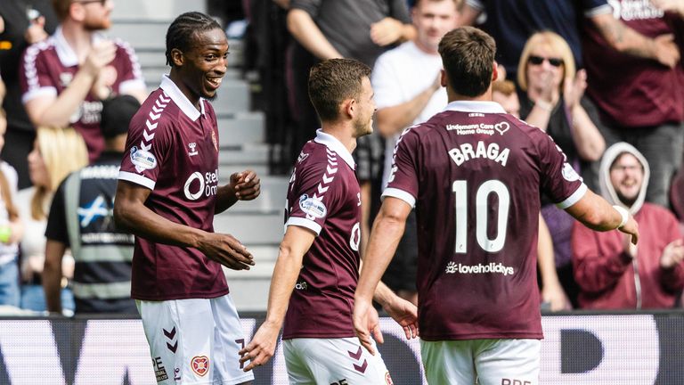 Hearts' Laurent Mendy celebrates with Claudio Braga after they went 2-0 up