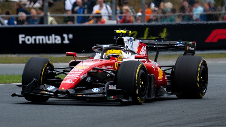 Lewis Hamilton (Scuderia Ferrari HP, United Kingdom, #44) in the SF-26, behind F1 branding and fans [supporters] / spectators in the dunes, Photo by: Nordphoto/Memmler/picture-alliance/dpa/AP Images
