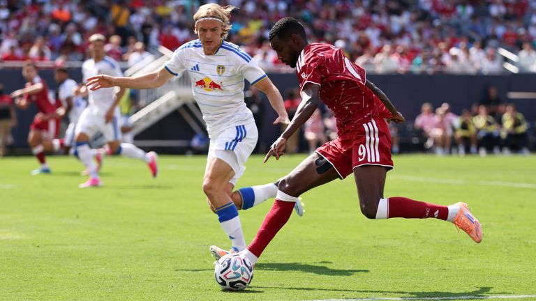 Alexander Isak competes for the ball