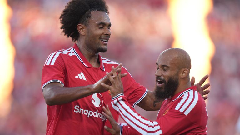 Manchester United's Joshua Zirkzee celebrates with Bryan Mbeumo after scoring against Leeds