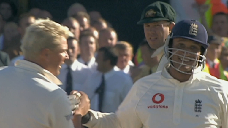 Shane Warne (left) gives Butcher a high-five during his epic innings