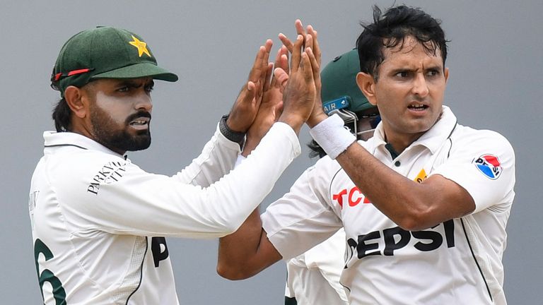 Mohammad Abbas (right) and Babar Azam of Pakistan celebrate victory over the West Indies