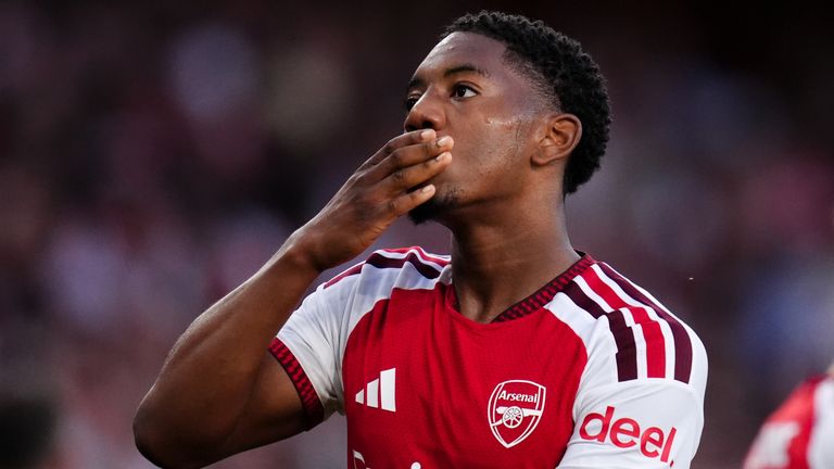 Arsenal's Myles Lewis-Skelly celebrates after scoring against Como