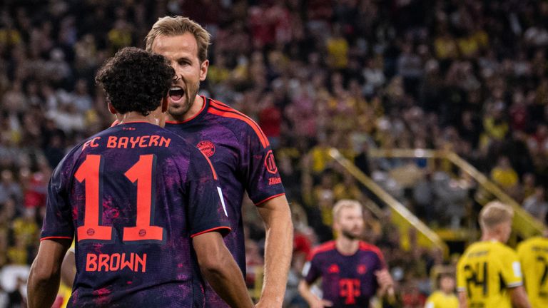 Nathaniel Brown of FC Bayern Munich celebrates with Harry Kane after scoring
