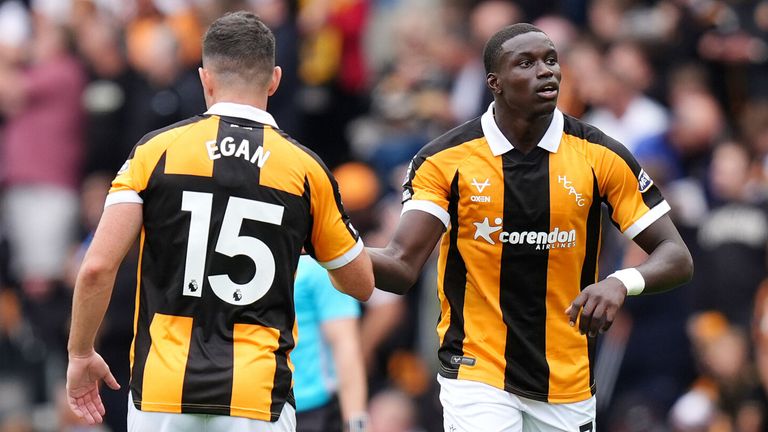 Nobel Mendy celebrates after doubling Hull's lead against Manchester United
