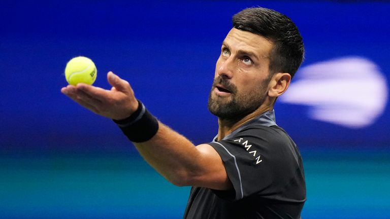 Novak Djokovic, of Serbia, serves to Mariano Navone, of Argentina, during the first round of the U.S. Open tennis championships Sunday, Aug. 30, 2026, in New York. (AP Photo/Frank Franklin II)