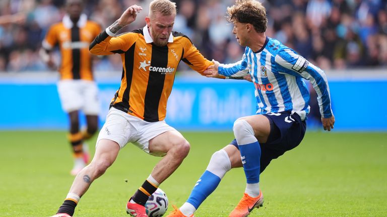 Is Hull City's Oli McBurnie (L) in line for a Scotland return?
