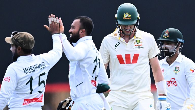 Australia captain Pat Cummins departs after being dismissed by Mehidy Hasan of Bangladesh on day four of the first Test