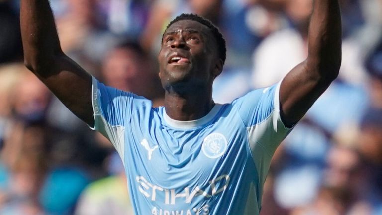 Marc Guehi celebrates after equalising for Man City against Bournemouth
