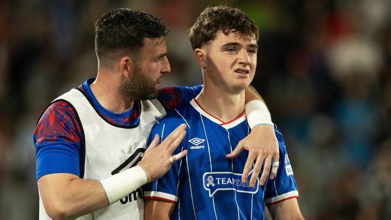 Findlay Curtis is consoled after missing his penalty