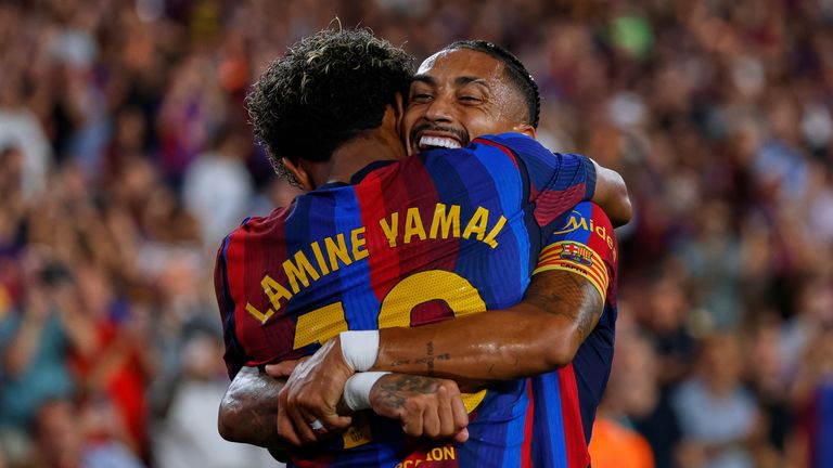 Barcelona's Lamine Yamal and Raphinha celebrate during the win over Rayo Vallecano