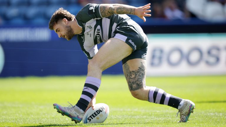 Rogers goes over to extend Huddersfield's lead
