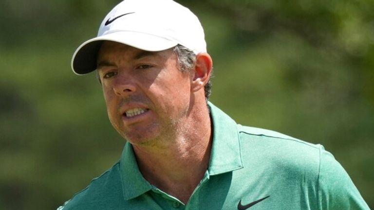 Rory McIlroy, of Northern Ireland, reacts to his putt on the second green in the final round of the BMW Championship 